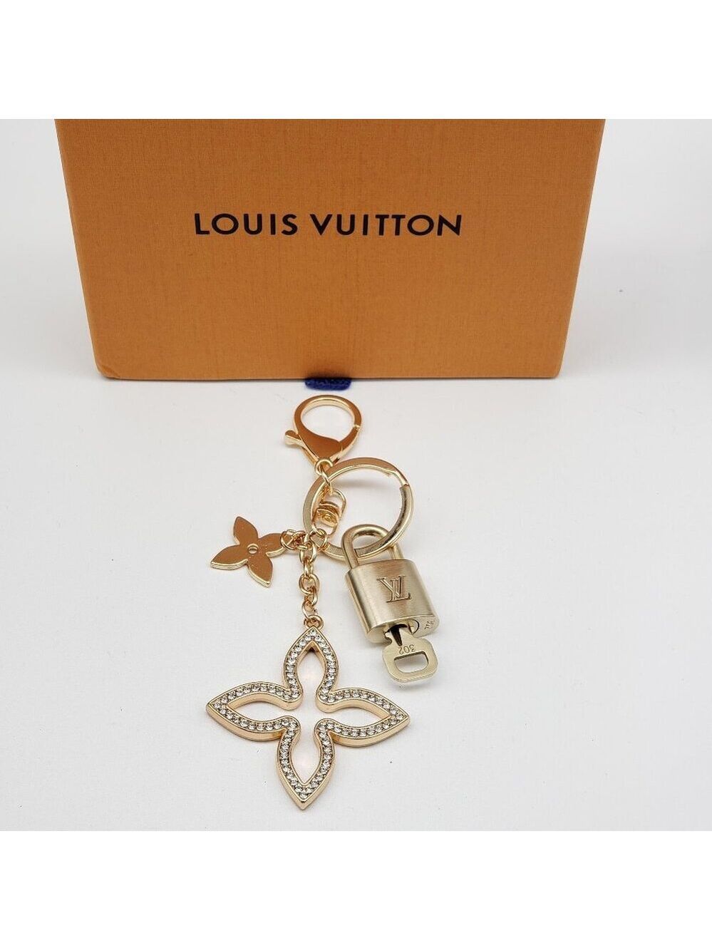Authentic Louis Vuitton Gold Lock & Box w/ Unbranded Clover Bagcharm - Picture 8 of 9